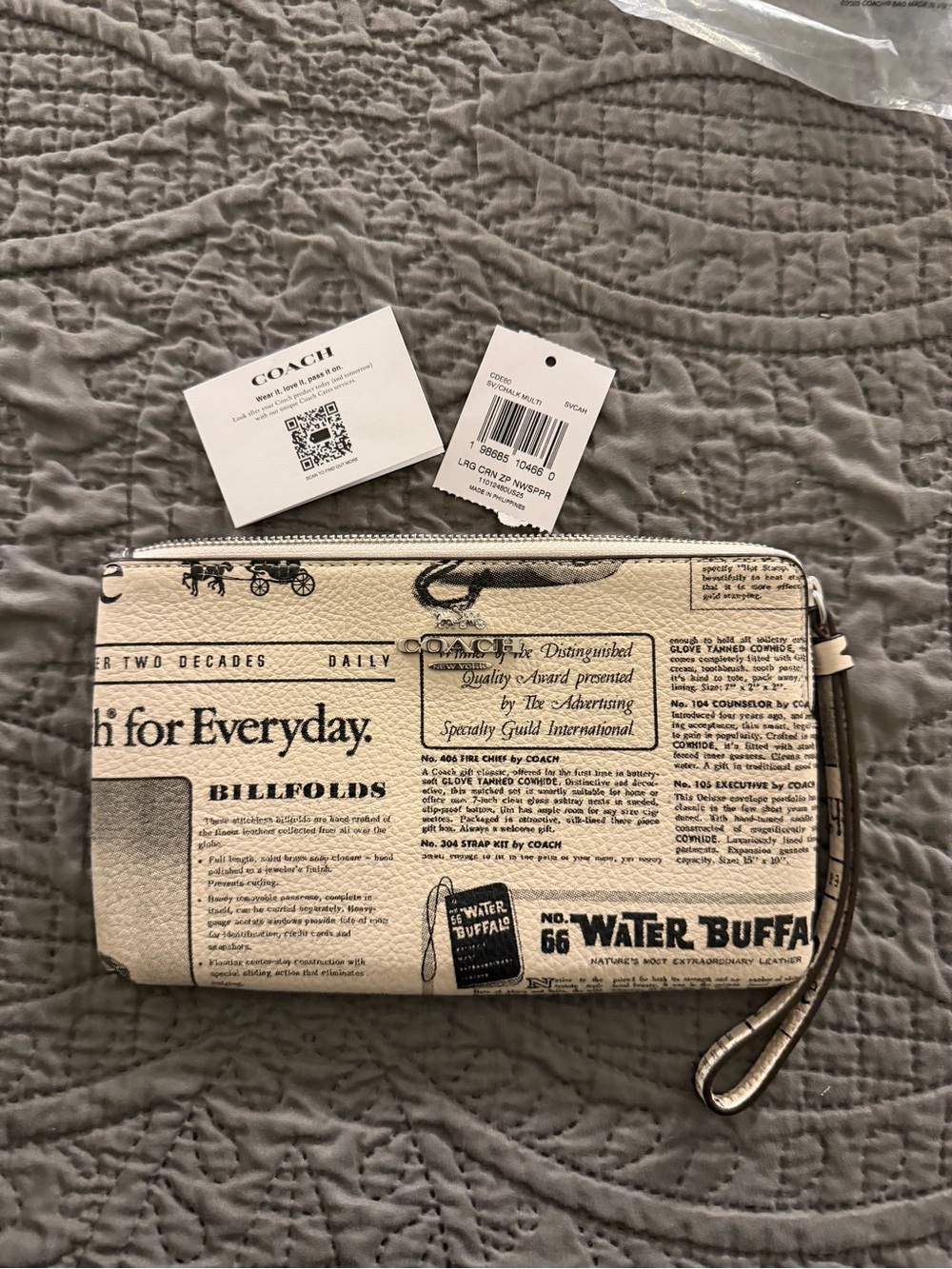 COACH Beige and Black Newspaper-Print Wristlet
